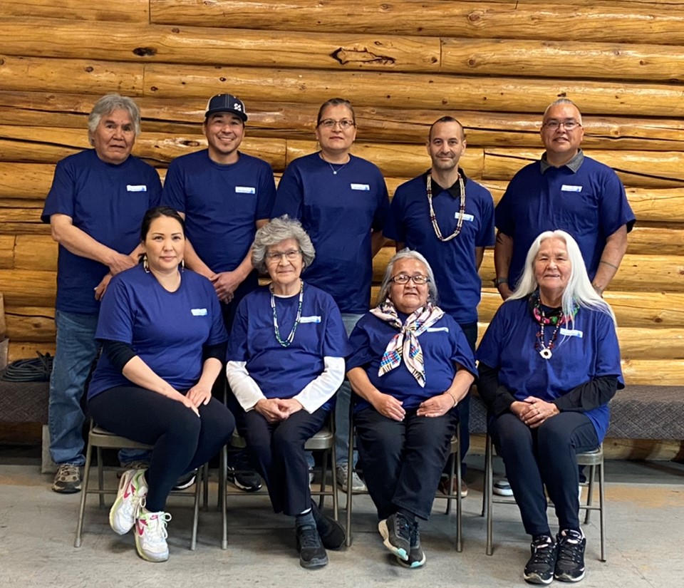 Seth De Ya Ah Board group photo 2024, 9 people in 2 rows all in blue SETH shirts in Tribal Hall